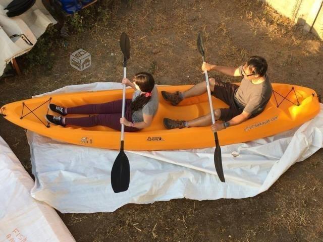 Kayak dos adultos + un niño
